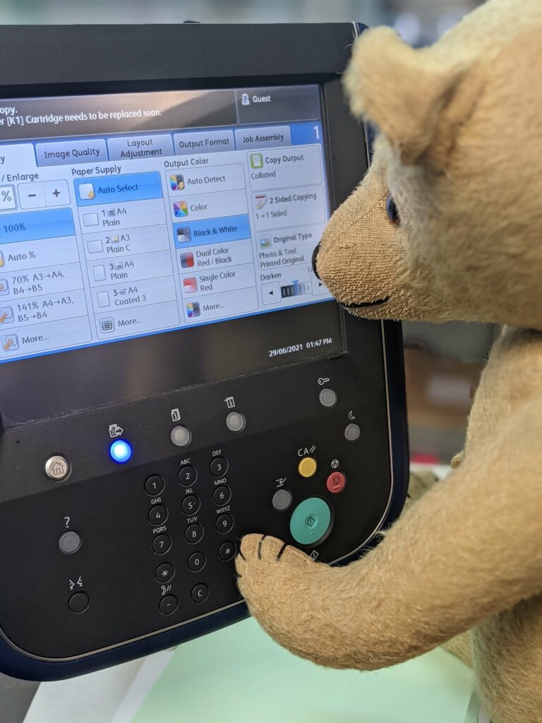 Teddy is operating the cop machine controls