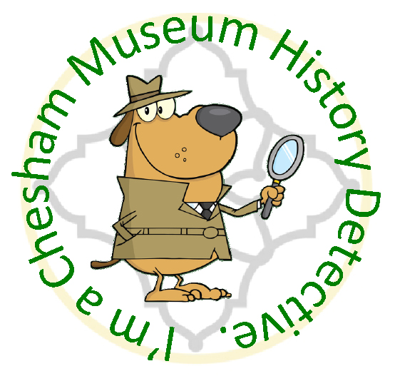 Chesham Museum history detective sticker with a dog dressed in a tie and taupe jacket and hat carrying a magnifying glass