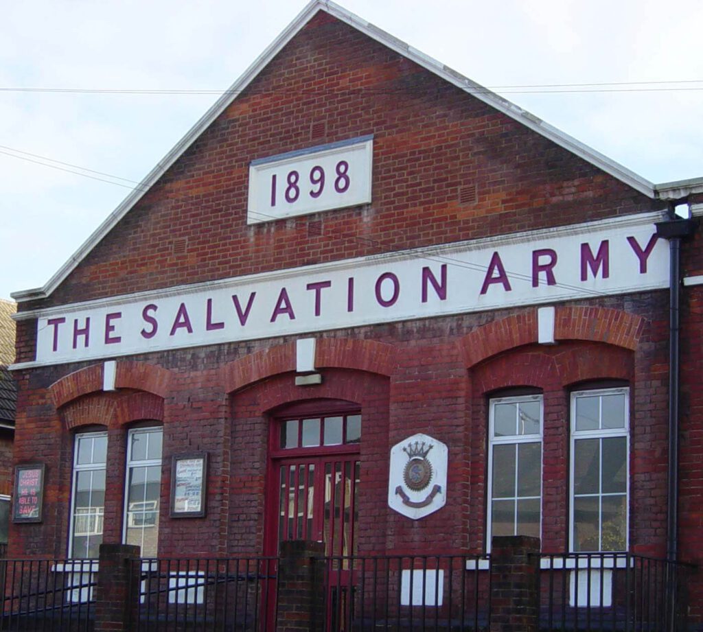 The front of the Salvation Army building with the date 1898 above the building sign
