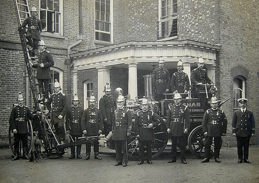 The New Century and a new look - 1911 and Chesham’s fire fighters wear polished brass helmets - part of the new 1904 issue uniforms. The Bury provides the backdrop, with the enlarged porch, still seen today.