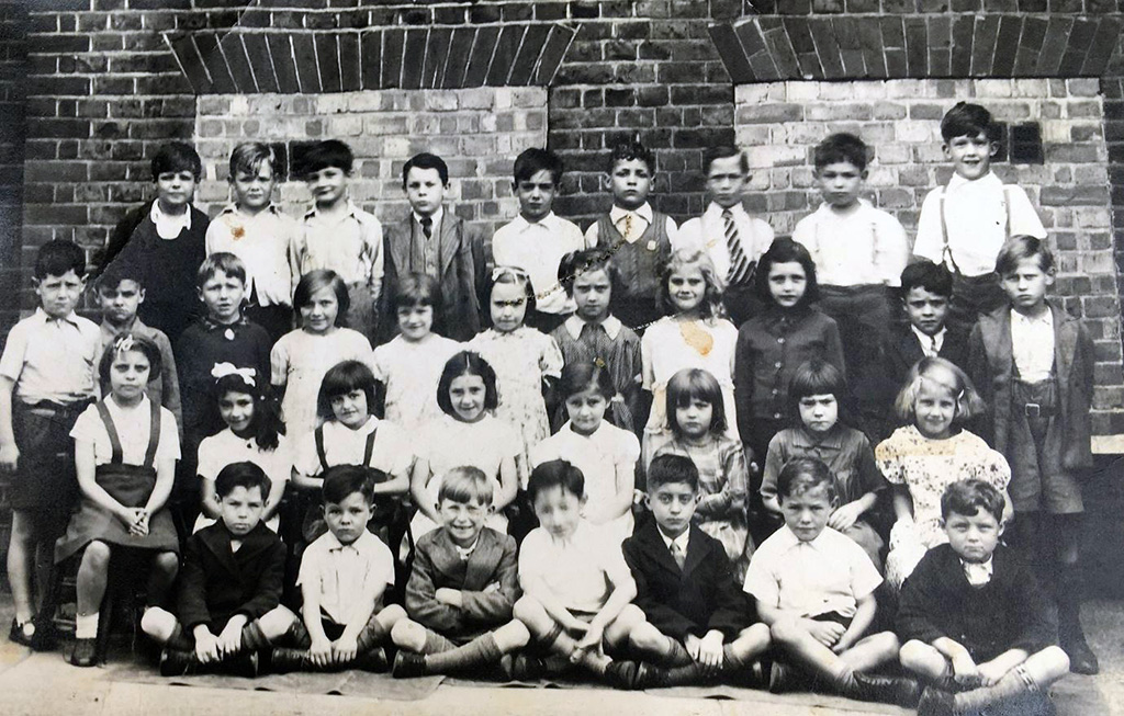 Children outside Whittington School, Highgate Hill, London