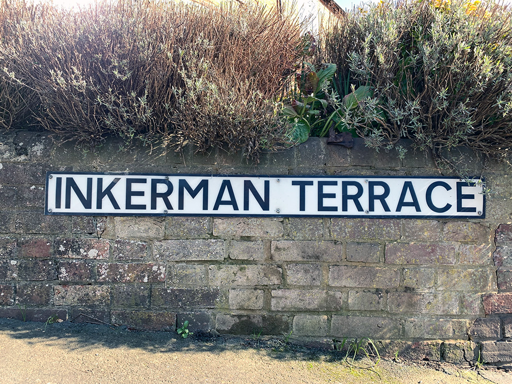 Inkerman Terrace road sign on a wall
