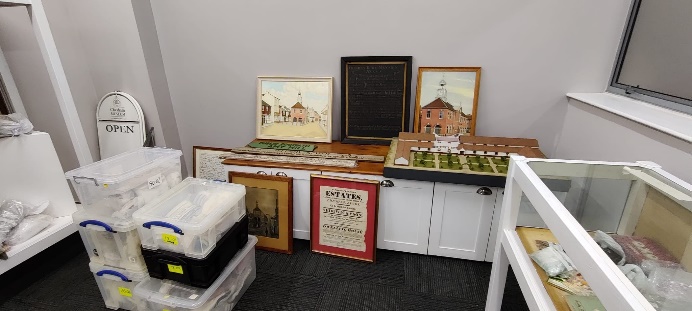 Various Chesham Museum collection items inside the exhibition space