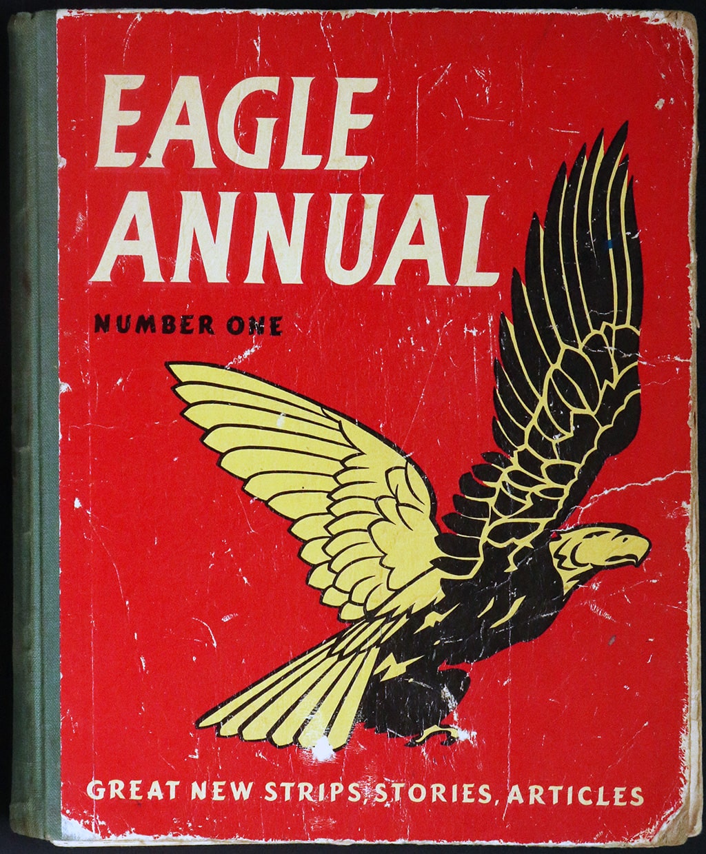 Front cover of Eagle Annual number one. The cover has a red background with an illustration of an eagle.