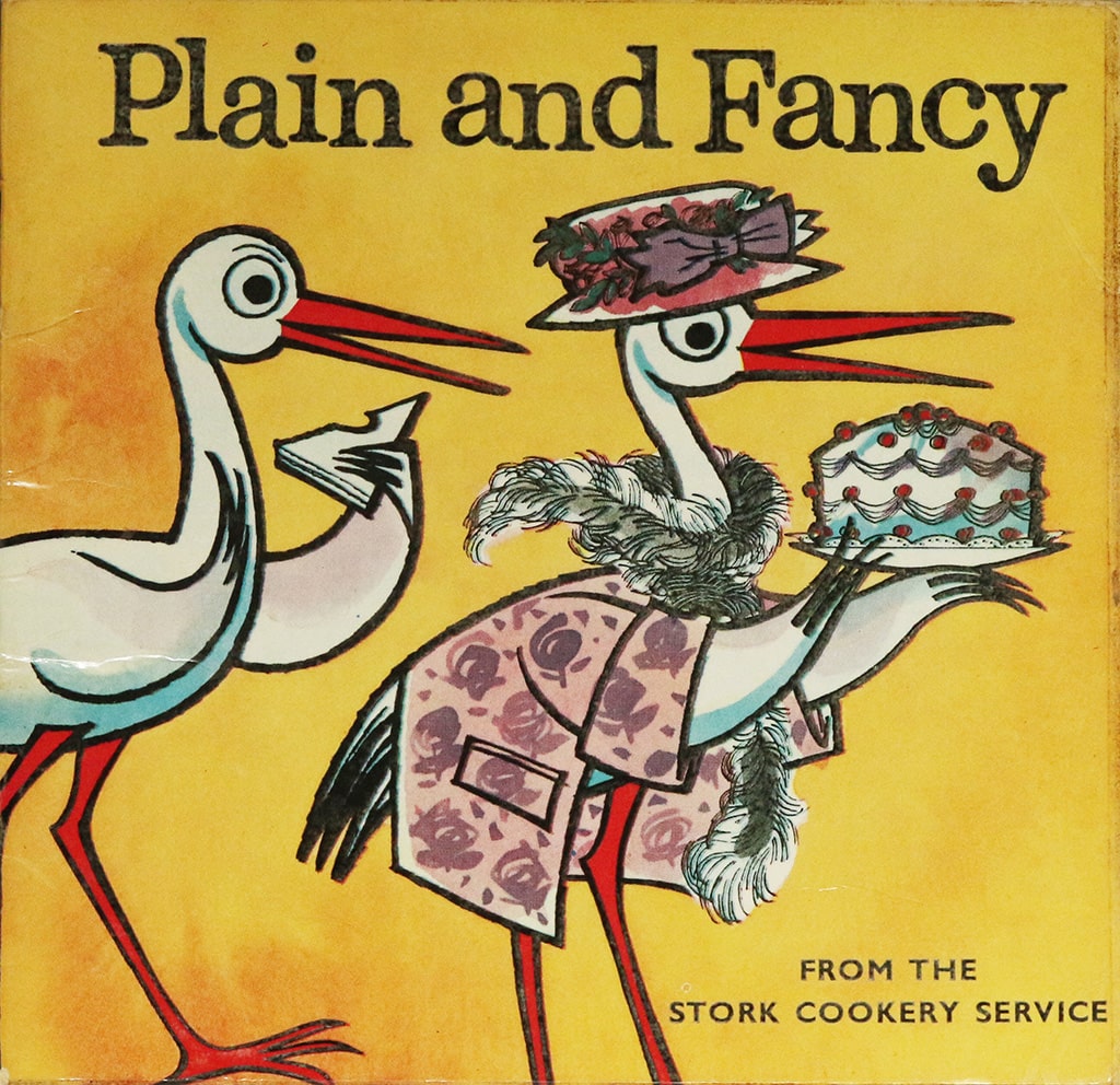 Plain and Fancy front cover. From the Stork Cookery Service. It shows two illustrated storks - one holding a cake and the other a sandwich with a bite taken out of it.