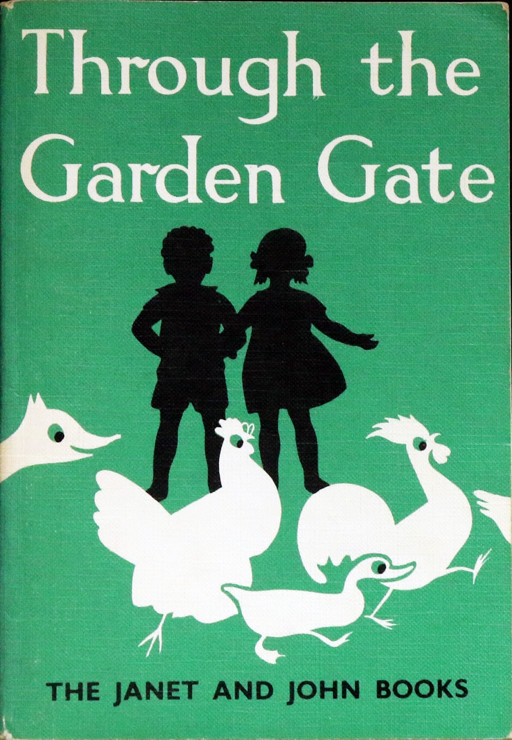 Through the Garden Gate front cover. The Janet and John books. It shows the silhouette of a boy and girl with some farmyard animals.